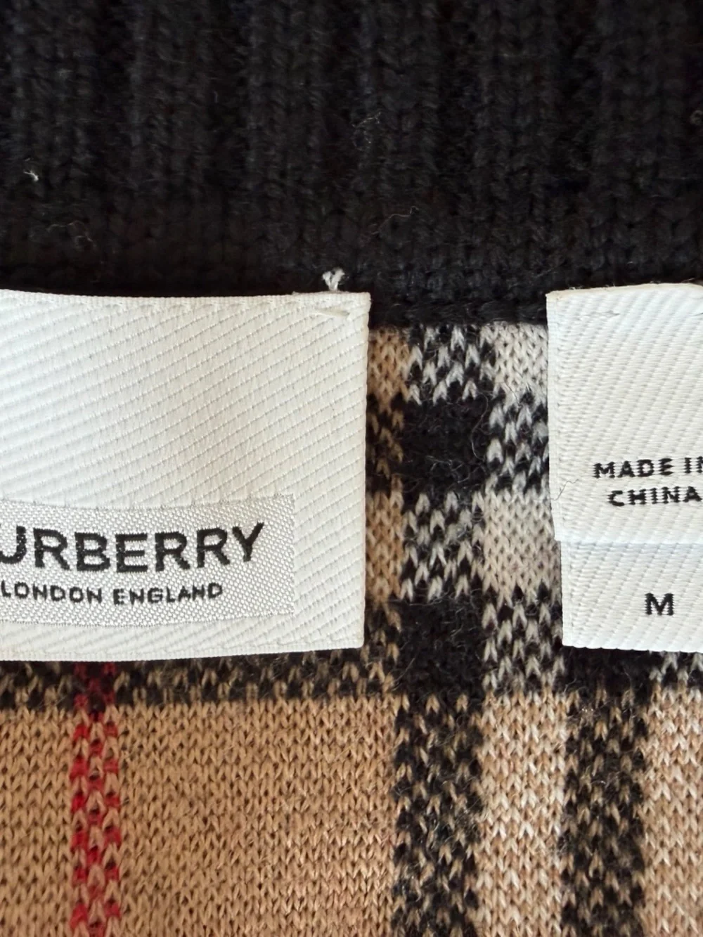 Reversible Burberry coat.